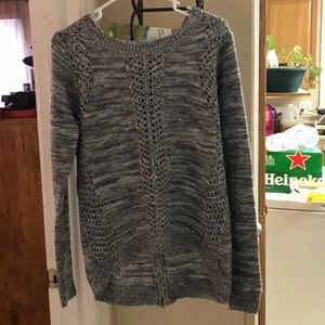 Beautiful gray and white holy sweater